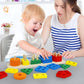 mom playing with kid by Montessori toy shape stacking board